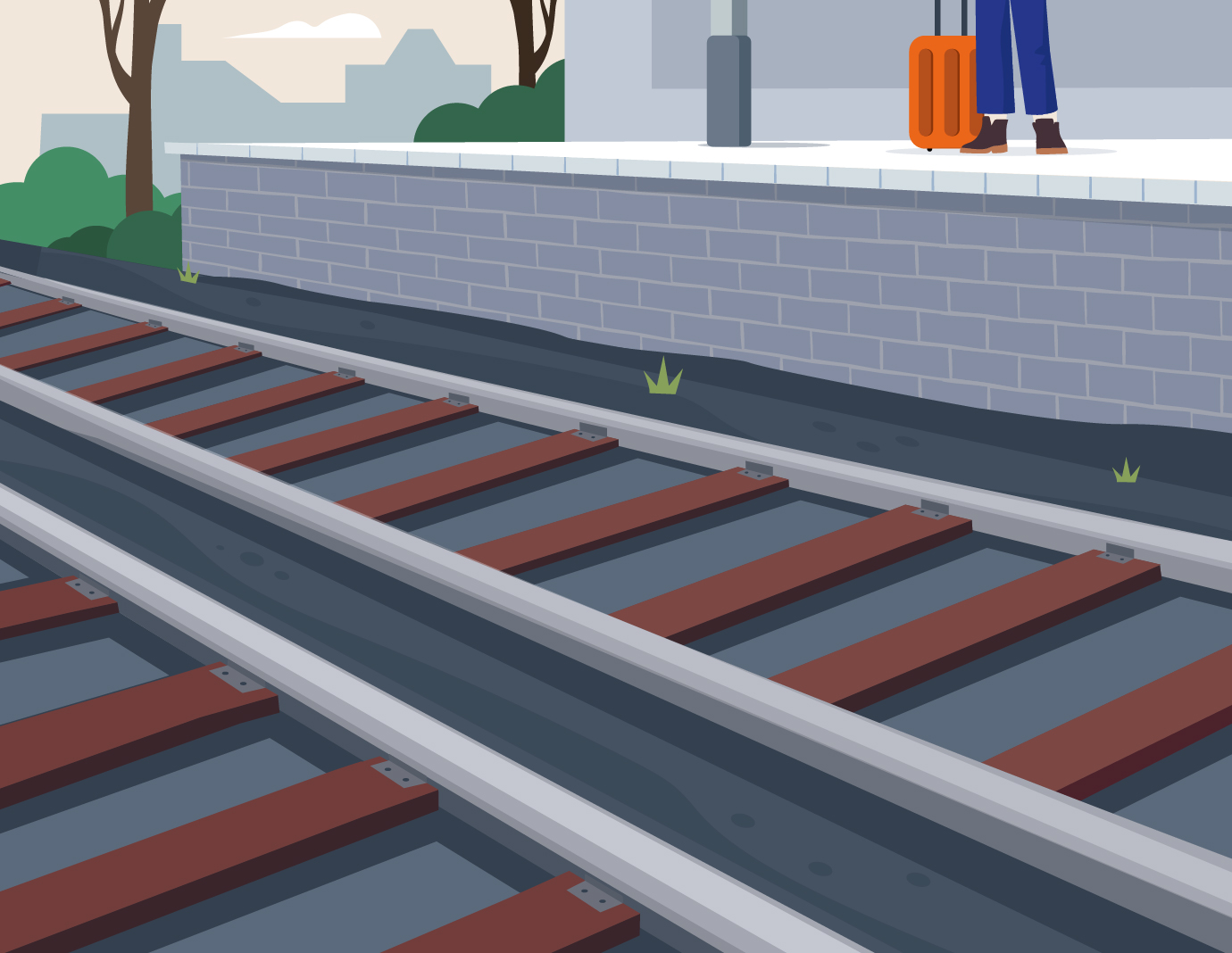 Bahnsteig mit Gleisen Bahnsteig mit Gleisen und wartenden Personen im Hintergrund